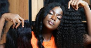 How to Install a Frontal Wig: Step-by-Step Guide for Beginners Black woman holding frontal wigs – how to install a frontal wig for beginners