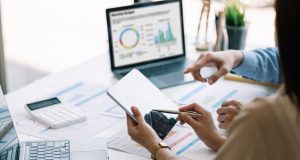 AI-Powered Project Management: Tools You Need to Know tech team using AI-powered project management tools