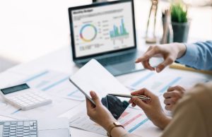 AI-Powered Project Management: Tools You Need to Know tech team using AI-powered project management tools