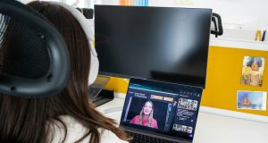 Top 7 Remote Interview Questions (and Winning Answers) for Email Marketing Roles woman having an online interview, demonstrating Remote Interview Questions for Email Marketing Roles