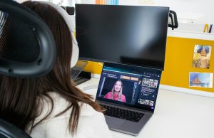 Top 7 Remote Interview Questions (and Winning Answers) for Email Marketing Roles woman having an online interview, demonstrating Remote Interview Questions for Email Marketing Roles