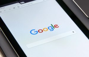 10 Free Chrome Extensions That’ll Make Your Workday Easier Tablet displaying Google Chrome browser on screen, symbolizing productivity tools and free Chrome extensions that make work easier.