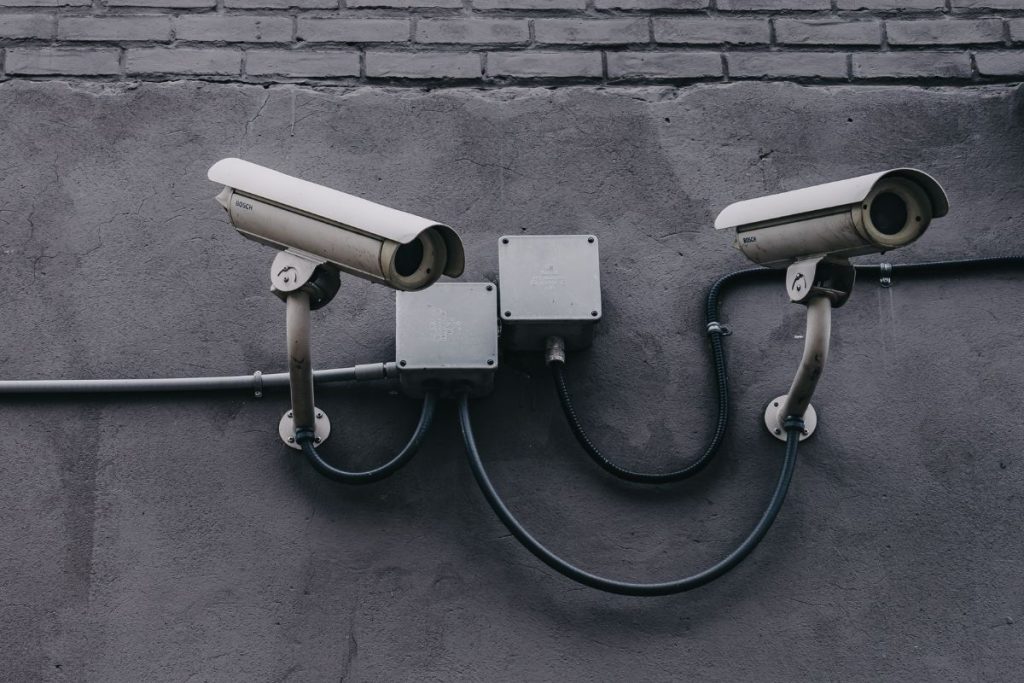 Two CCTV security cameras installed outside a building, showing the benefits of installing CCTV security cameras in homes and offices