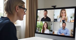 Time-Zone Management: 10 Tips for Productive Global Teams A woman participating in a virtual meeting with four smiling coworkers on screen, demonstrating effective time-zone management in a global remote team.